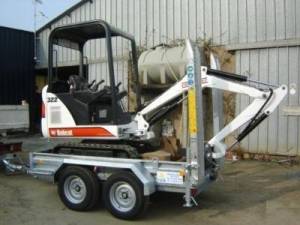 BOBCAT CON REMOLQUE BUEN ESTADO